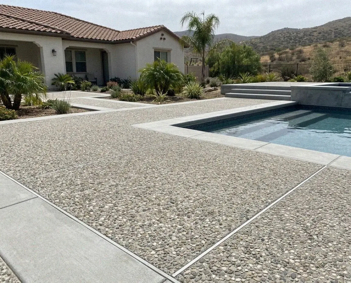 Stamped slate concrete patio behind a single family home in Corona